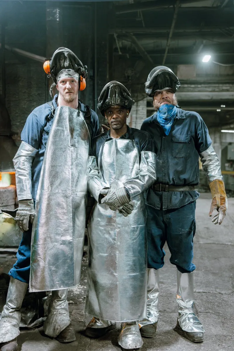 Mike, Stefan and Andy in aluminised foundry gear on the shop floor at Keystone Foundry